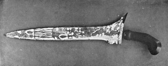 An old keris decorated with an episode from Mintaraga (Arjoena Vivaha) (Stutterheim, W. F., Pictoral history of civilization in Java. Translated by Mrs. A. C. de Winter- Keen, The Java-Institute and G. Kolff & Co., Weltevreden, 1926)