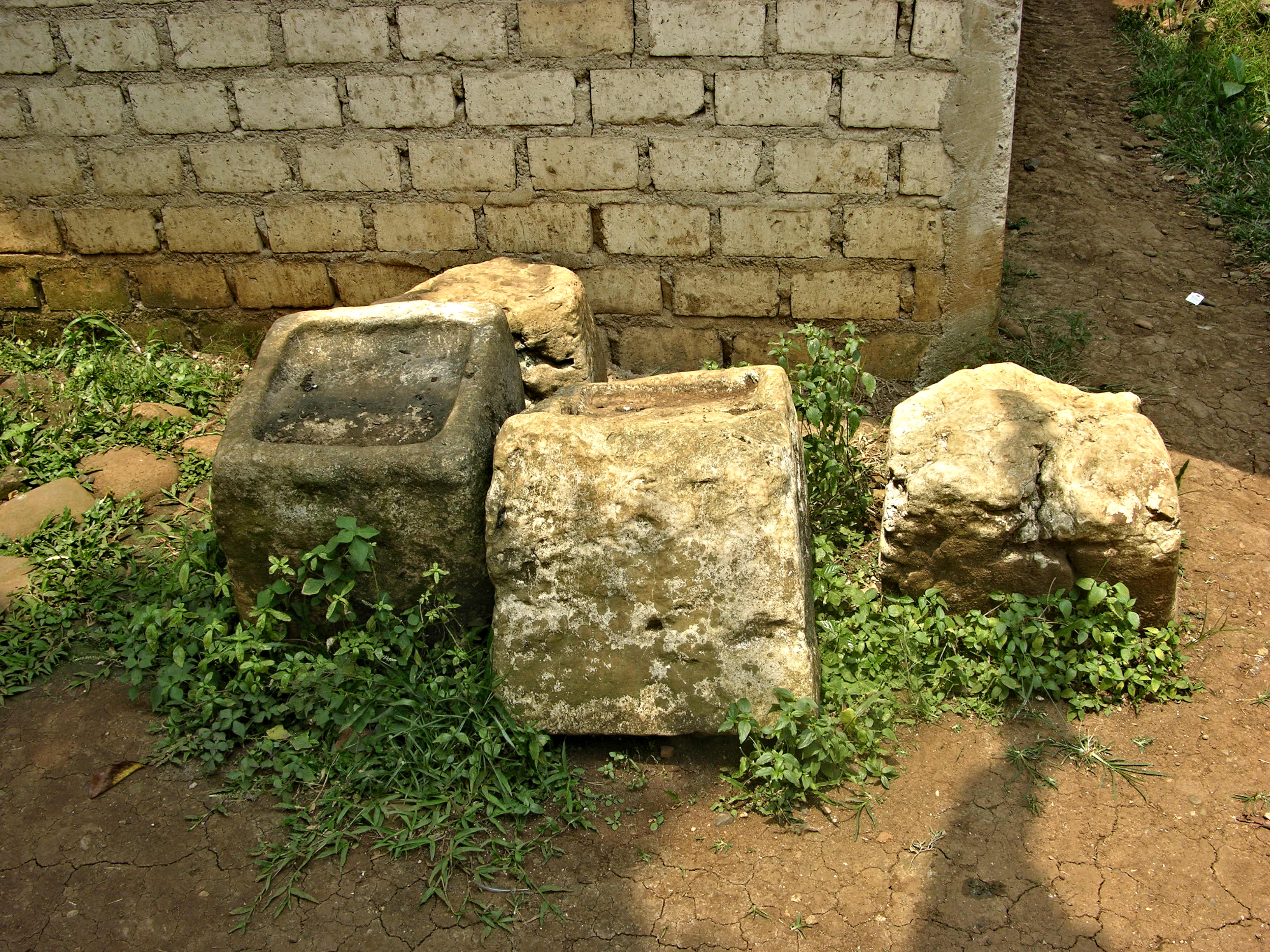 Foundation stones of Tarumanagara Age found in Ciaruteun Village, Ciampea District, Bogor Province, West Java, Indonesia, 2008.09.16. The large cubic stones of ca. 50 cm square, with a concave of ca.40 cm square on the upper side must have been of use for a palace or some magnificent building.